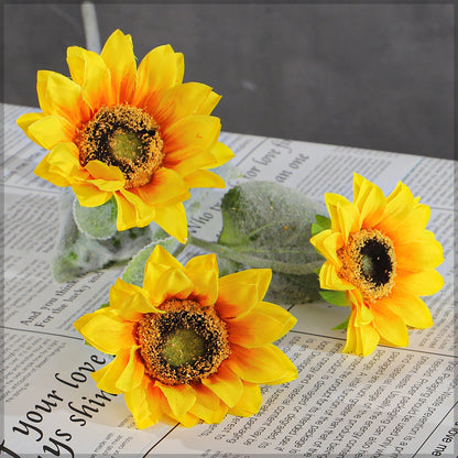 fake sunflowers in vase